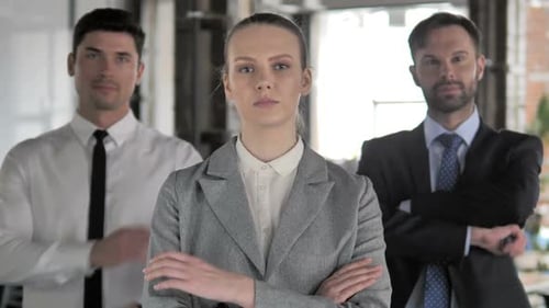 Confident Business Team Stands in Office