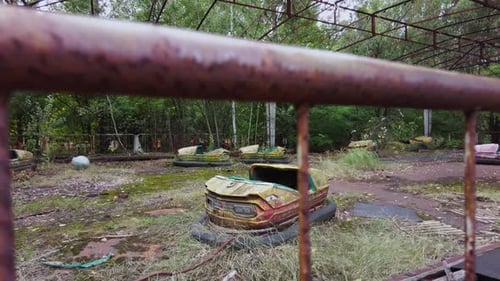 Abandoned Bumper Cars in the Amusement Park in Ghost Town of Pripyat
