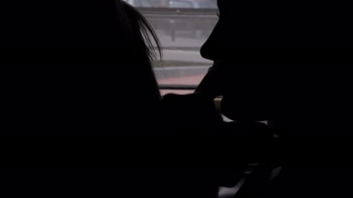 Silhouetted Couple Embracing in an Intimate Moment