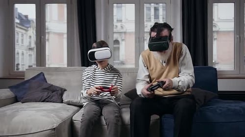 Grandfather and Child Play VR Video Games at Home