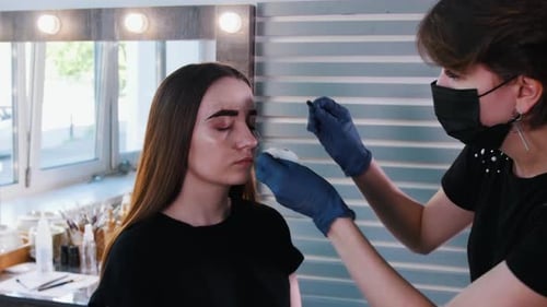 Eyebrow Shaping at a Beauty Salon
