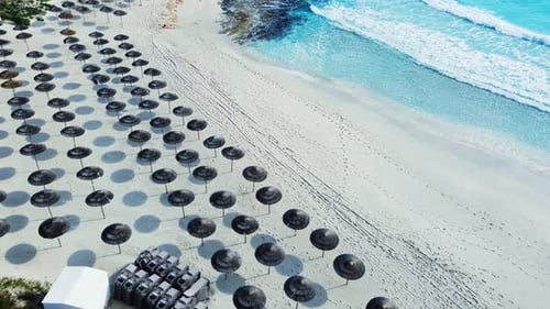 Aerial View of Umbrellas at Sandy Beach Sunny Weather