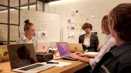 Meeting of multiracial professional teamwork with coworkers at the business office.