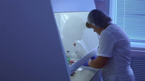 Medical Professional Conducting Research in Sterile Lab