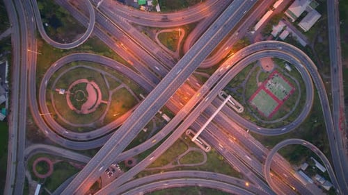 4K : Hyperlapse drone shot over highway multi-level junction road.