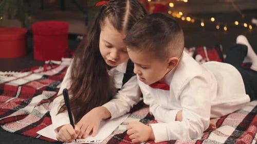 Children Write Letter to Santa at Christmas