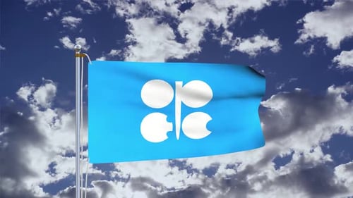 OPEC Flag Waving Against Cloudy Blue Sky