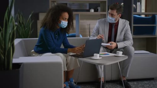 Multinational Business Couple Working Computer Wear Face Masks at Home Office