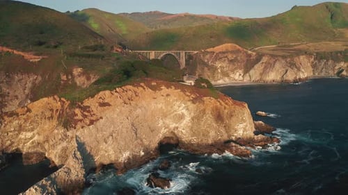 Sunset Over Nature of California Coast. Panoramic View of Scenic Big Sur Bridge