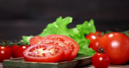 Tomatoes and Lettuce on a Wooden Table