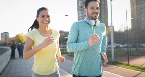 Athletic Couple Jogging Together