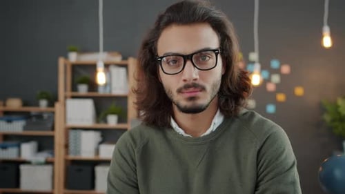 Slow Motion Portrait of Handsome Arab Man Office Worker in Workplace at Night