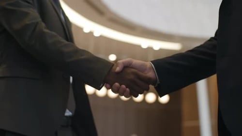 Multi Ethnic Partners Making a Deal