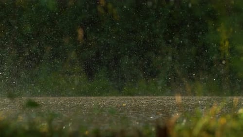 Raining on a road, slow motion