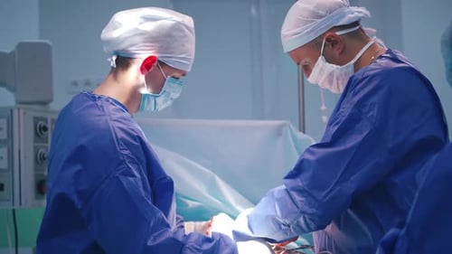 Surgeons Performing a Delicate Operation in Hospital
