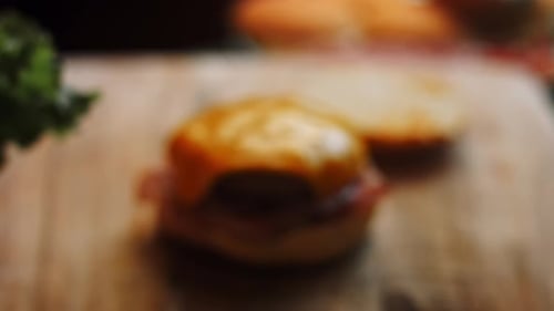 Burger Preparation with Cheese and Fresh Lettuce