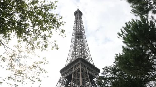 Slow tilt on famous symbol of France and Paris Eiffel tower 4K 2160p UltraHD footage - Beautiful Tou