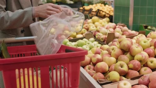 Buying Fresh Fruit In Supermarket