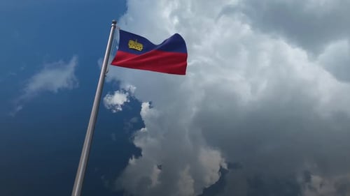 Waving National Flag of Liechtenstein in Cloudy Sky