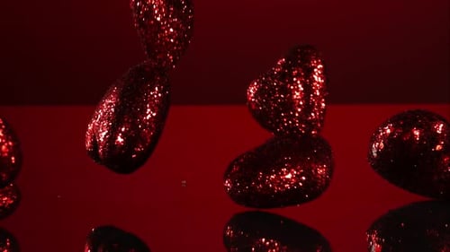 Decorations falling, bouncing in ultra slow mo