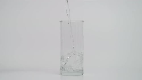 Clear Water Being Poured Into a Glass
