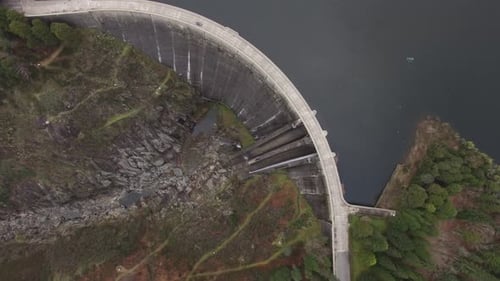 Flying over Car on Hydroelectric Dam