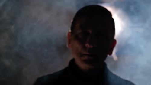 Dark Silhouette in Smoky, Mysterious Close-Up