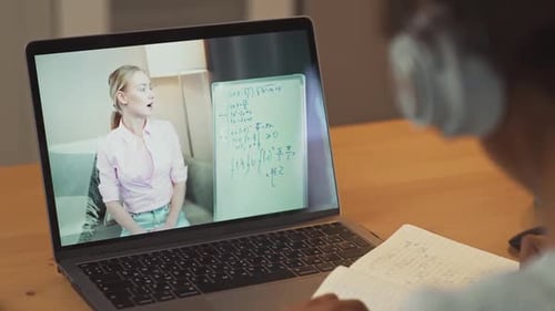 Student Attends Engaging Online Math Lesson at Home
