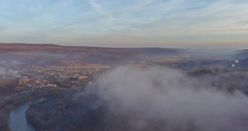 Misty Foggy Mountain Landscape with Autumn Forest