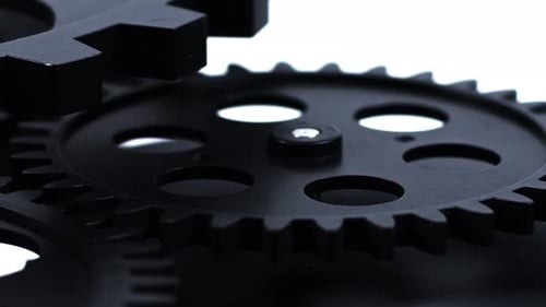 Rotating Black Clock Gears Mechanism Close Up