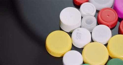 Few Plastic Bottle Caps - Plastic Processing Recycling Industry