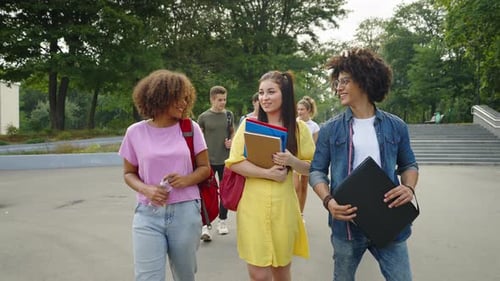 Diverse Students Walking on College Campus