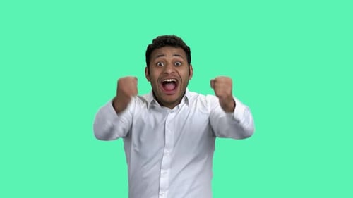 Man Expressing Excitement and Celebration on Green Screen