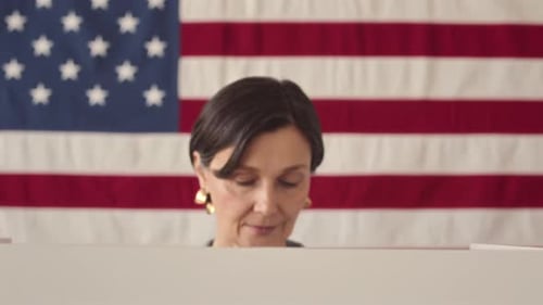 Caucasian Woman at Vote Booth