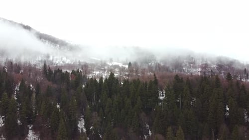 Snowed and Misty mountain Aerial View