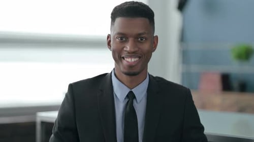 Portrait of African Businessman Smiling at Camera