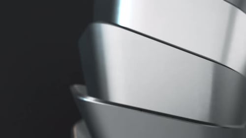 Modern Metallic Logo Reveal with Rotating Abstract Shapes