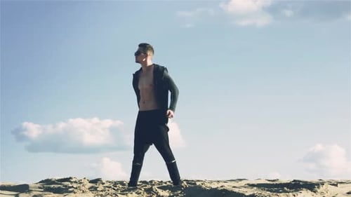 Man Look Around in Desert