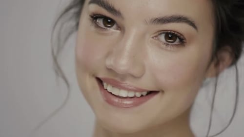 Smiling Woman with Makeup Close Up