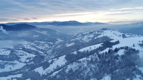 Aerial View in Foggy Sunset Winter Mountain