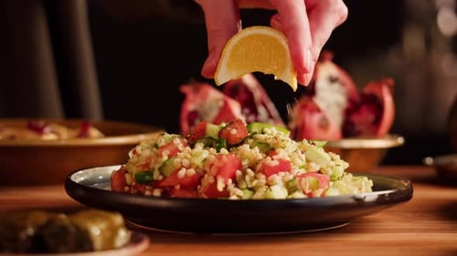 Fresh Salad is Dressed with Squeeze of Lemon