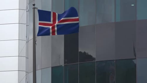 Icelandic Flag Waving Animation with Modern Building