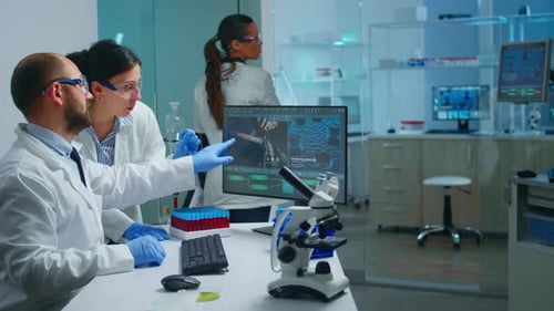 Scientists Analyze DNA Data in Bright Laboratory