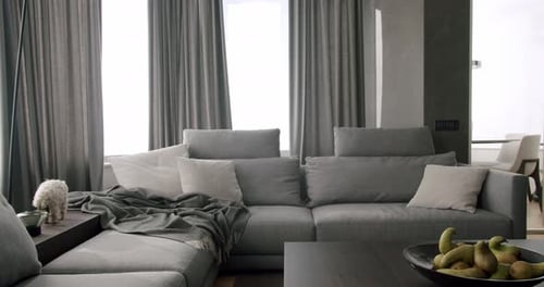 Stylish Modern Living Room with Gray Sofa and Pears