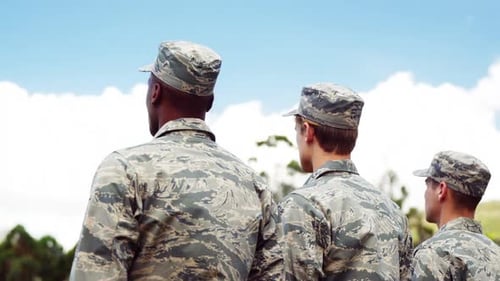 Soldiers Standing Together Outdoors