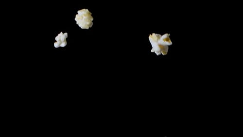Popcorn Falling Isolated on Black Background