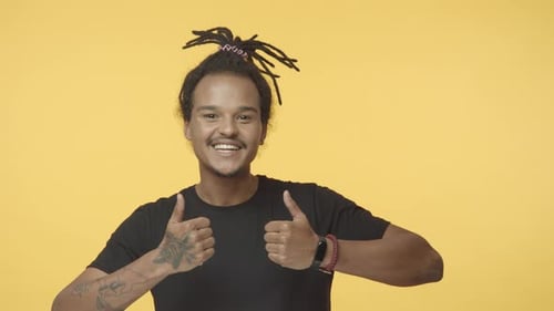 Enthusiastic Man Giving Two Thumbs Up Approval