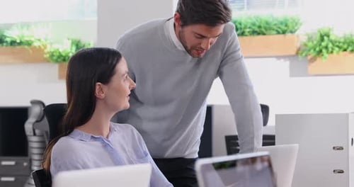 Smiling executives discussing with each other 4k