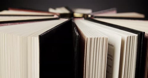 Books Arranged in a Circle with Open Pages