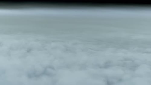 Aerial View of Flowing Gray and White Clouds